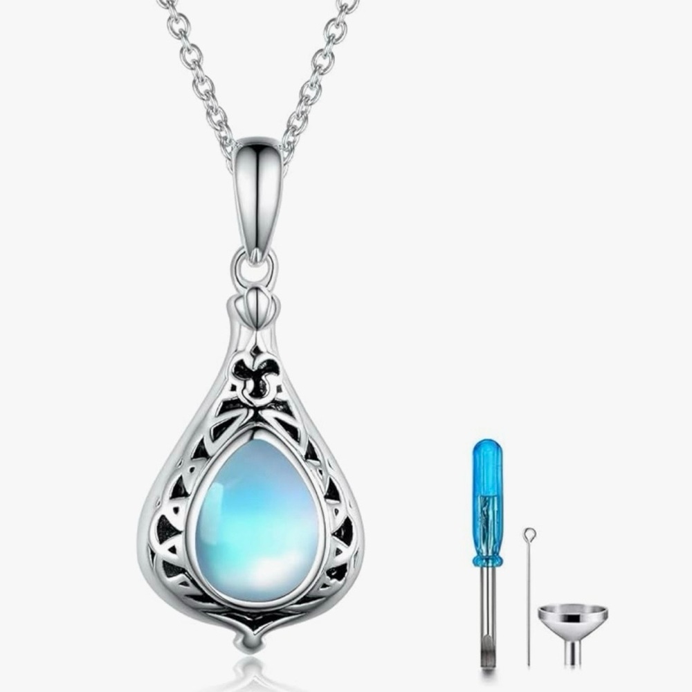 Elegant Silver Pendant Necklace with Blue Gemstone